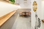 The Fibonacci Stone terrazzo tiles selected for Waffee cafe reinforce its earthy colour palette