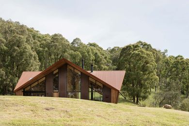 With its origami-like roof, the house appears almost as a sculpture in the landscape.