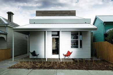 Faux finish: the Victorian-style weatherboard facade is new – a council requirement, despite the existing building being 1980s brick-veneer.