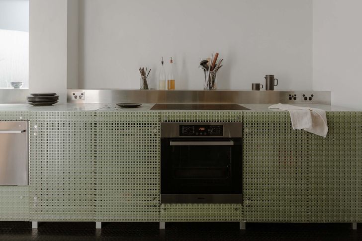 Offcut Kitchen by Second Edition is made from fibre-reinforced plastic, a material commmonly used for walkways.