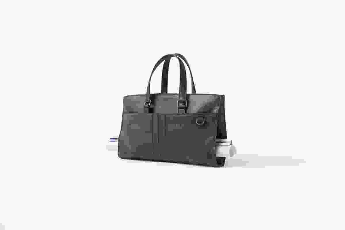 When folded in half, Nendo's Architect Bag for Tod's is capable of hold A4 drawings in two separate spaces and rolled up drawings in middle.