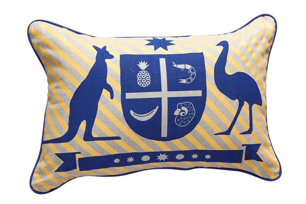 Everingham & Watson cushion printed with a tongue-in-cheek Australian crest of banana, prawn, ram and pineapple.