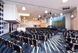 The flexible auditorium can be divided into three or used as a single space for worship in either blackout or day-lit conditions.