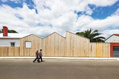 The western edge wall/fence follows the shape of the interior spaces.