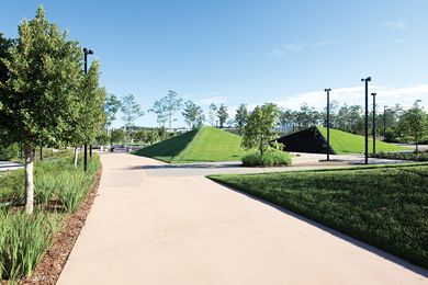 Pyramidal lawns provide visual interest as well as a place for kids to play.
