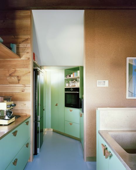 Colour enlivens the predominantly timber interiors.