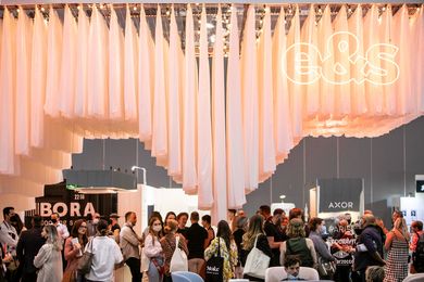 Ruffled drapes create a spatial and sculptural volume at the E&S stand.
