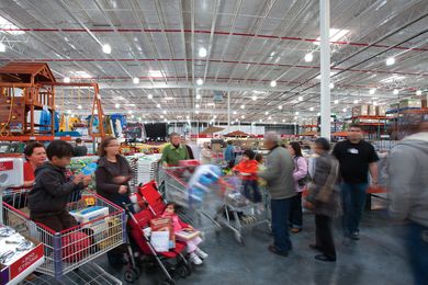 Satisfied shoppers weave their way amongst the plentiful merchandise.