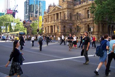 The w:Sydney Town Hall, with pedestrians crossing w:George Street, Sydney by Enoch Lau, licensed under  CC BY-SA 3.0
