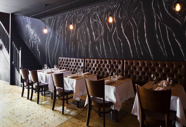Leather banquettes are a nod the Italian tradition. 