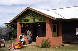 An example of a concrete block house provided by Tangentyere Council and designed by Jane Dillon and Mark Savage for Alice Springs town camps between 1984 and 1986. The design is characterized by extensive verandah and sleep-out areas for external activities and visitor accommodation.