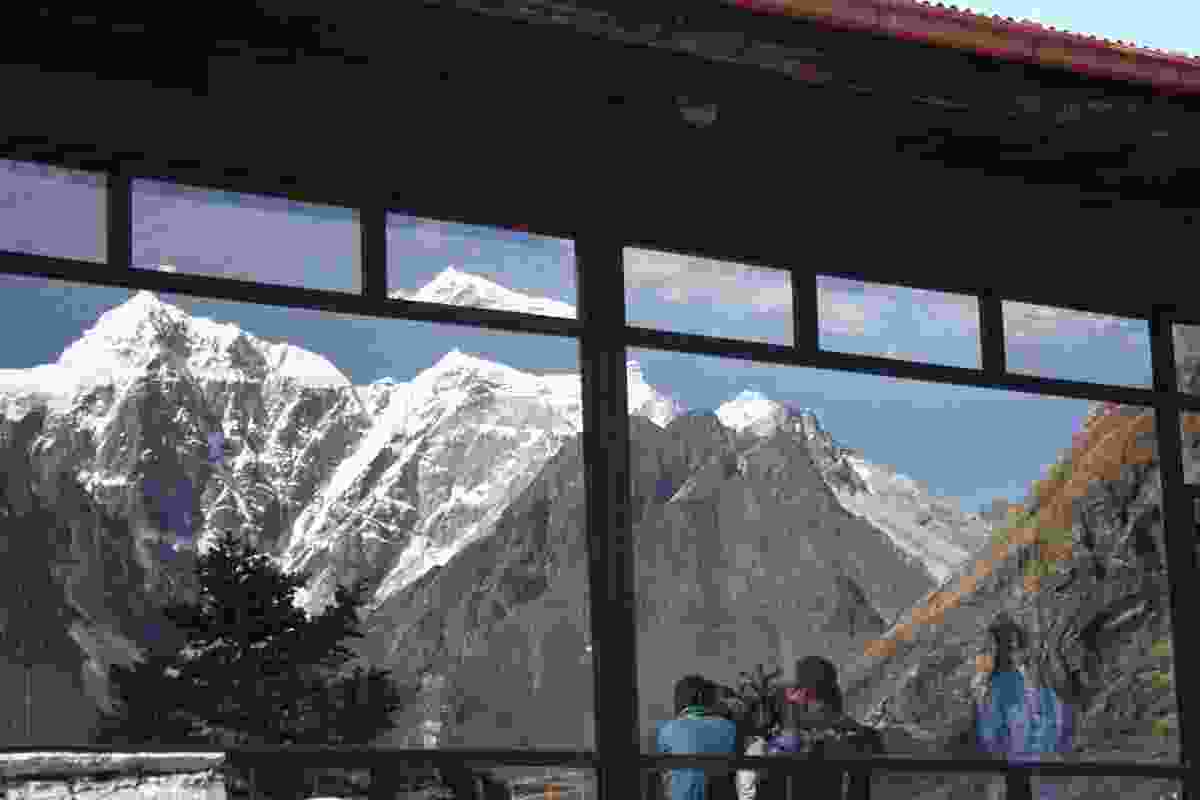 Himalayan giants Everest, Lhotse and Nuptse reflected in windows at the Hotel Everest View.