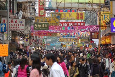 A crowded Hong Kong street by Hamedog, licensed under CC BY-SA 3.0