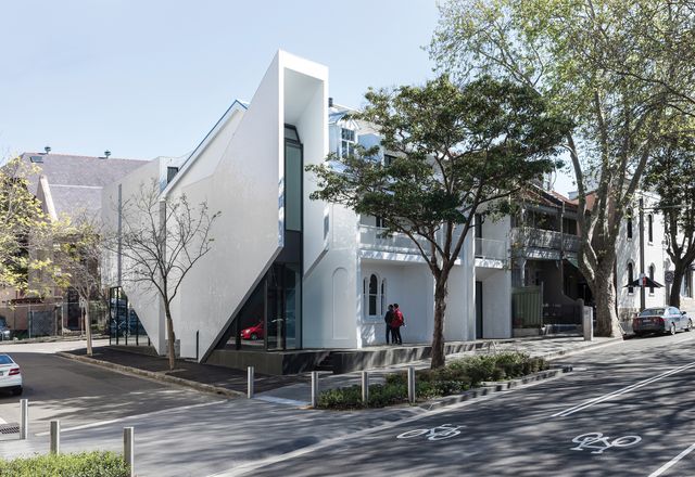 White tile cladding applied to the new component is reminiscent of the Sydney Opera House as well as the long association that Surry Hills has with the Portuguese community.
