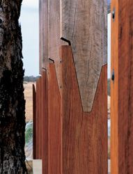 Detail of
the “grafted” ironbark pergola posts, which extend into
the landscape.