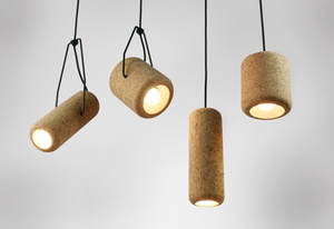 The design playfully engages with the iconic Australian cork hat while embracing cork's sustainable properties.