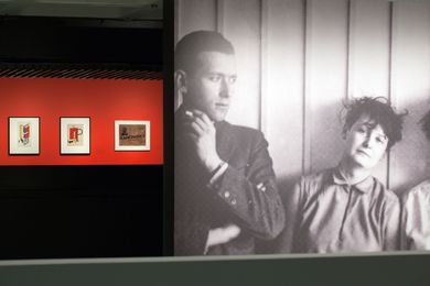 Large-scale projection of an archival photograph of Marcel Bruer with Martha Erps.