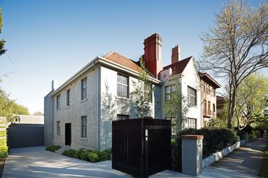 New, crisp interiors have been created behind the original facade of this 1920s duplex.