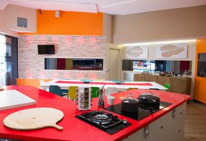 The Big Brother kitchen benches are Silestone Rosso Monza from Cosentino.