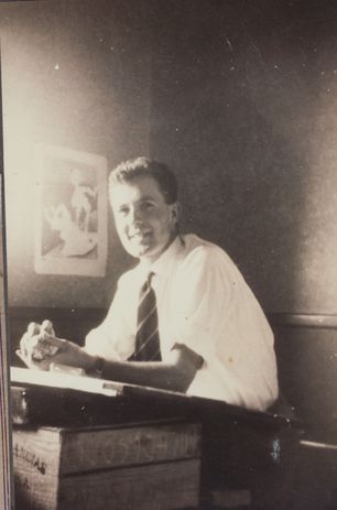 Hugh O'Neill at the drawing board in Ormond College, 1954.