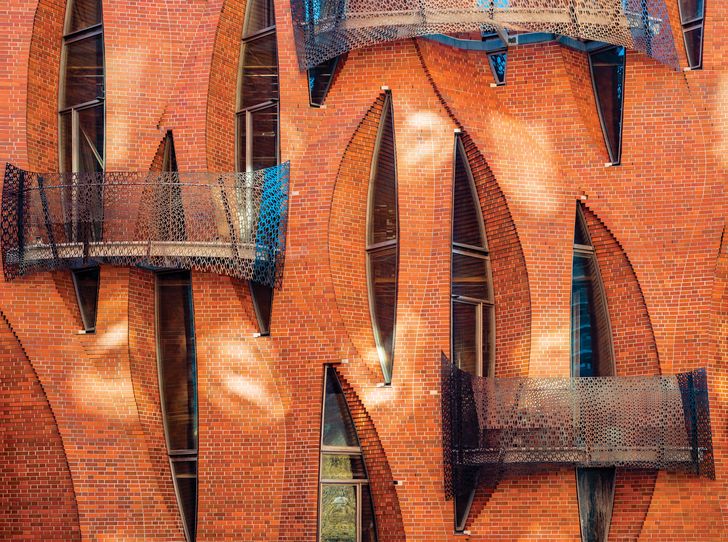 The ironically named Unhistoric Townhouse in Tribeca, New York, uses its facade as a strategy to disrupt heritage and connect with the street.