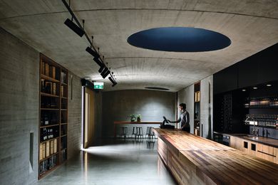 The cellar door is a shallowly vaulted linear space with a flexible plan, allowing it to serve as a wine- and produce-tasting retail space, a long banquet room and everything in between.