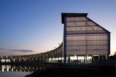 The lantern-like entry tower exaggerates the scale of the building and celebrates its structure.