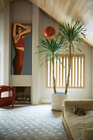 Matsu relaxes in his Southampton, New York, home designed by interior designer, Timothy Godbold.