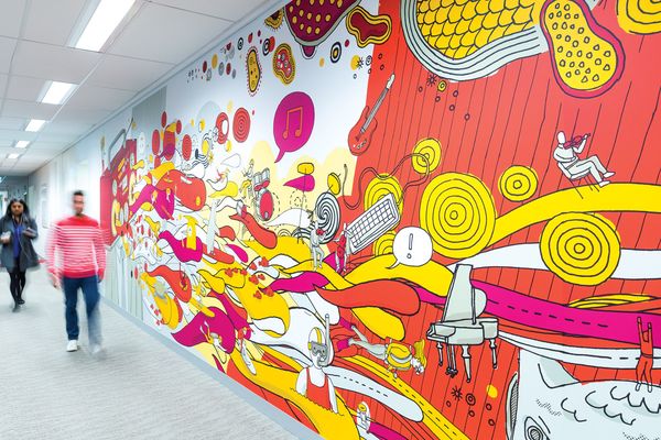 The murals provide visual respite for the staff who spend much of their time on the phone.