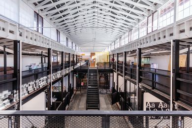 Studios are contained within the two-storey stables wing. First-floor studios on new floors are broken up with floor-to-roof voids that allow views of the original structure.