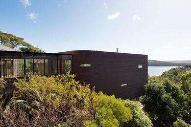 The house’s eastern edge projects out over the landscape.