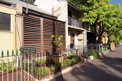 The eastern facade of the Glebe House has a subtle street presence, hiding the extension at the western end.