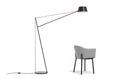 The Spar floor light by Jamie McLennan is inspired by the masts of sailing boats and the upholstered form of the Felix Chair by Simon James contrasts with an industrial-style base.