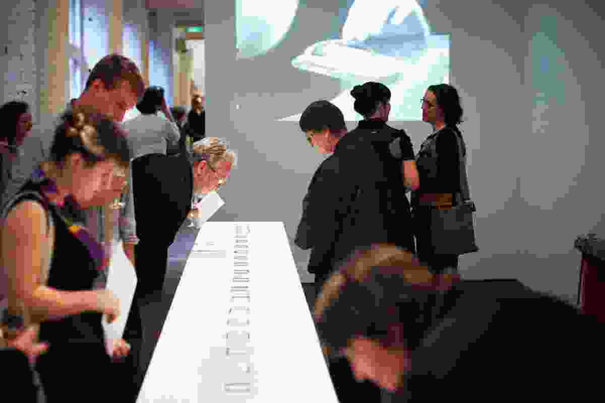 Unfold exhibition experience - guests invited to hold Phoebe’s bracelets.