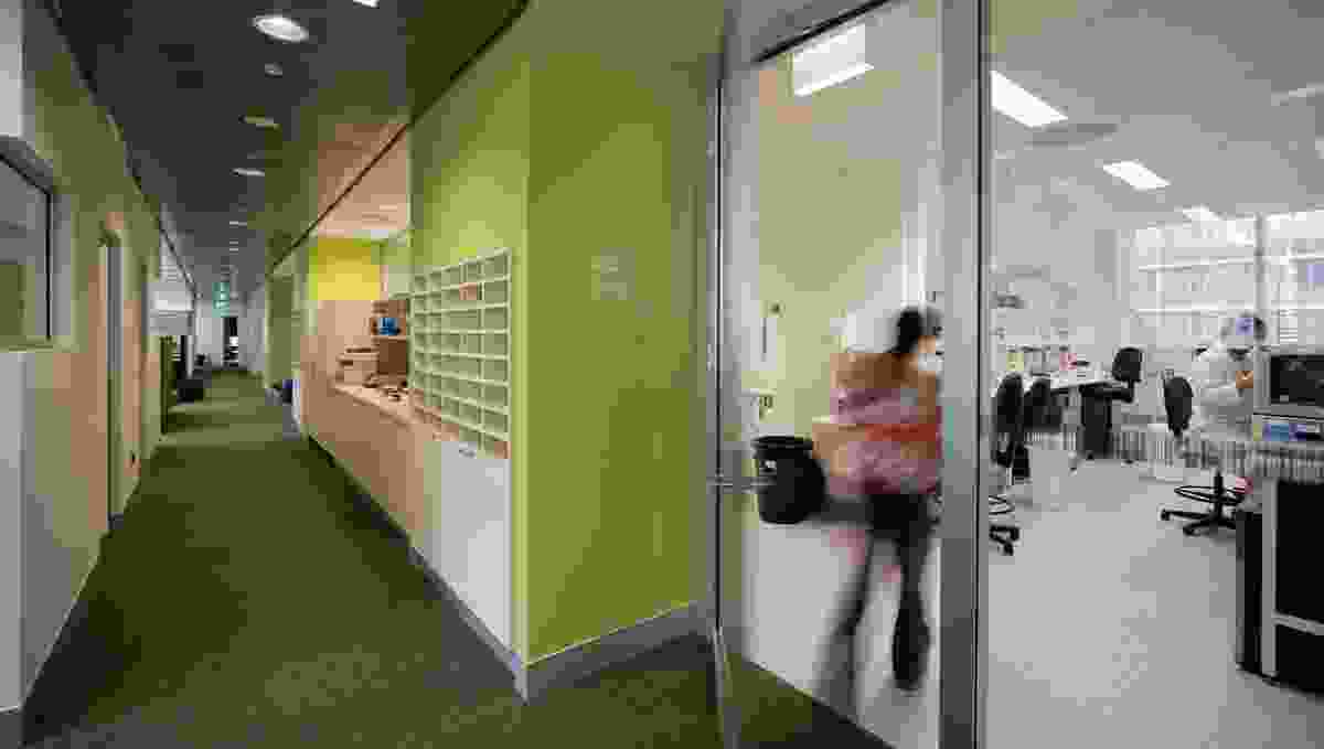 Corridors are generous and multifunctional to encourage socialization.