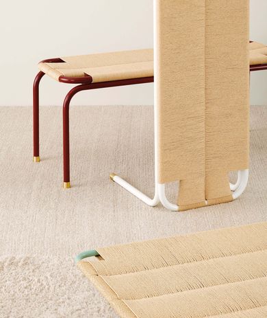 Handwoven Danish paper cord elevates the minimalist design of Rushcutters Bench.