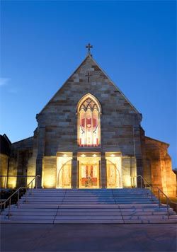 The new entry to St Patrick’s, through the nave of the old building. Entry gates are by Robin Blau and the stained glass windows designed by Klaus Zimmer and fabricated in Germany by Derix Glasstudio.