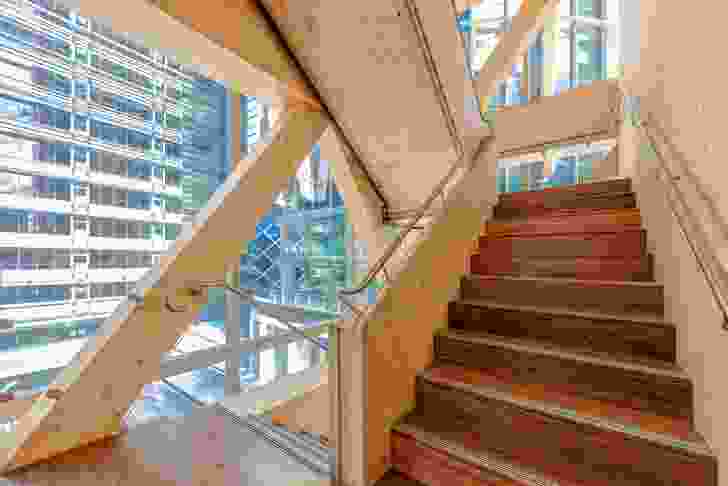 The building’s fire stairs are enclosed with fire-rated glass, welcoming light and views and encouraging circulation between floors.