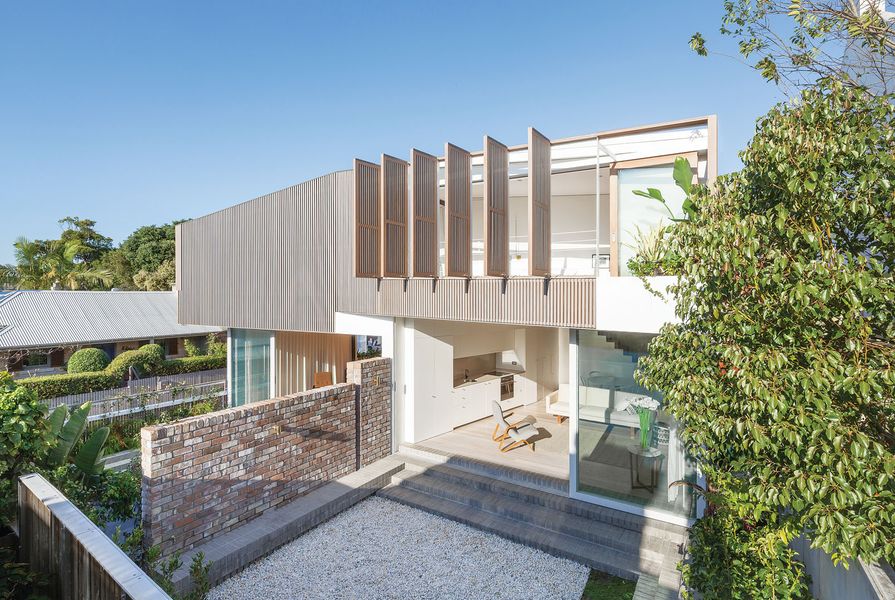 The Balmain Houses by Benn and Penna Architects are an example of an intergenerational home where the residents (particularly children and dogs!) move through the gaps in the dividing garden wall.