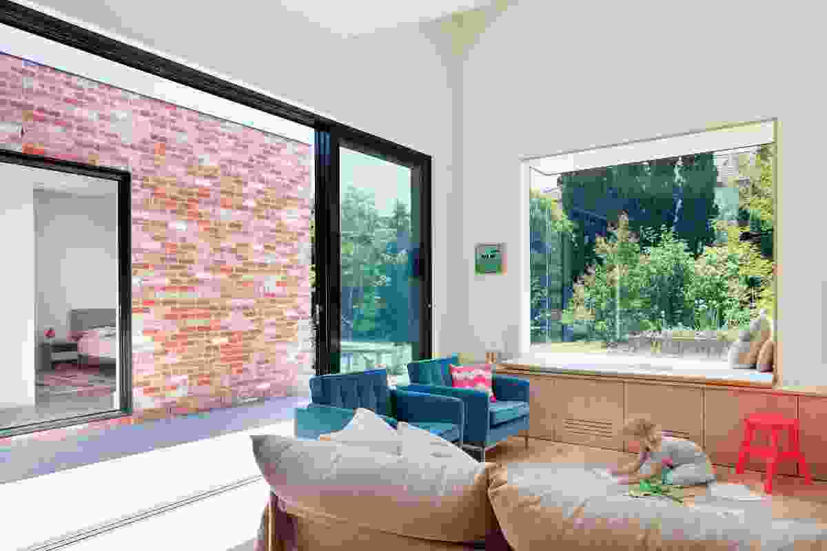 Large glass sliding doors on each wing allow the parents to keep an eye on young children.