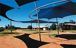 The central
meeting area at
Tjuntjuntjara is
protected from the sun
by an arrangement of
tensile shading devices.