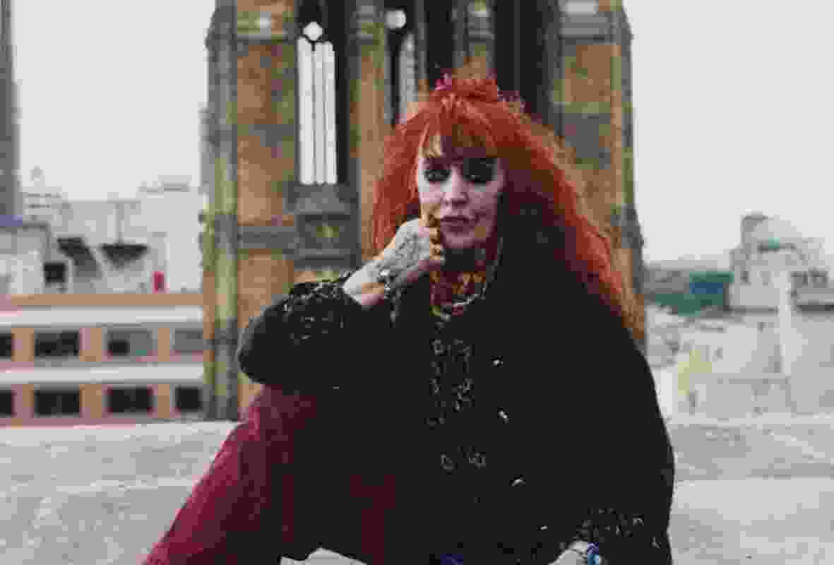 Vali Myers on rooftop overlooking Swanston St and St Paul’s Cathedral Melbourne - H2019.51/105, LTA 2542 Box, 2001, State Library Victoria.