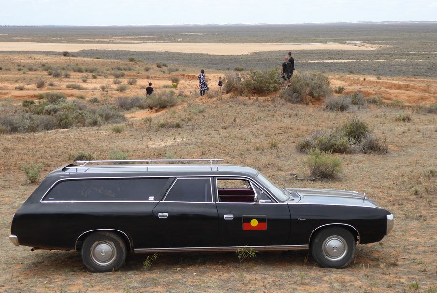Mungo Man’s remains arrived home in a 1976 black Chrysler Valiant hearse.