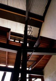 Ladder to the store above the northern-most office space, showing the enviropanel ceiling. Photographs Des Smith.