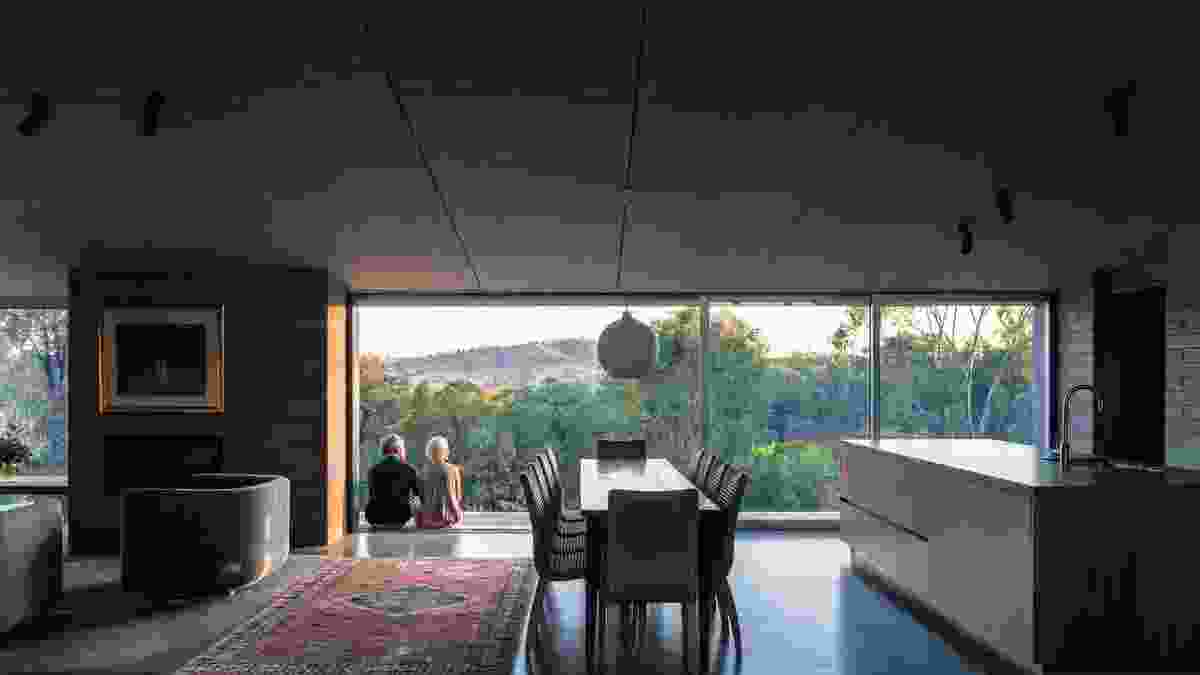 The dining area and verandah looks out to the garden and a majestic Mount Huon in the distance.