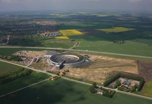 The mounded landscape surrounding the Snøhetta-designed MAX IV Laboratory in Lund, Sweden provides a green public park rather than a fenced, introverted research centre.