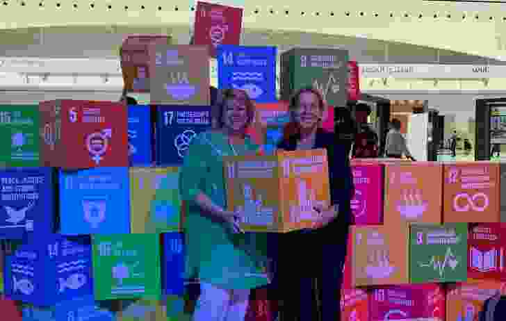 Leading Australian planner Dyan Currie with the author, Barbara Norman, and their pick of the SDGs in Abu Dhabi.