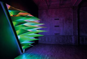 Primary, shown in Paris in 2015, is a three-sided wall installation illuminated by three LED light sources that reference the primary colours of light: red, green and blue.