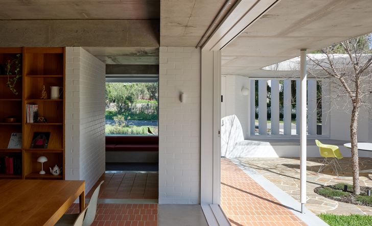The house sits along the southern edge of the site, allowing porosity through the site.
