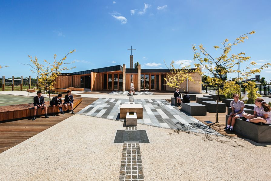 The Our Lady of the Southern Cross Chapel, shared by two schools in Berwick, Victoria, features a radial plan anchored by a ten-metre-high cross tower.